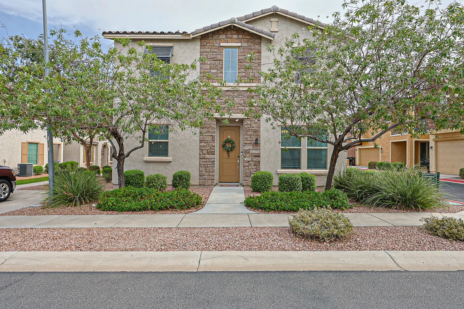17717 W Mandalay Ln Front Exterior Front exterior of 17717 W Mandalay Ln in Sierra Montana, Surprise AZ