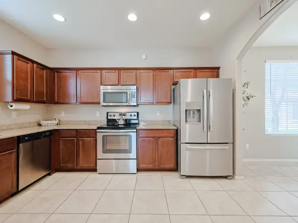 Kitchen with stainless-steel appliances in Surprise AZ rental home