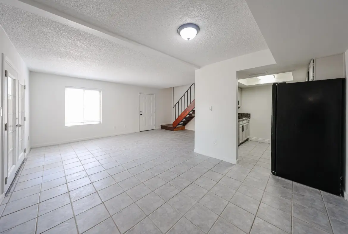 Open living area leading to the updated kitchen