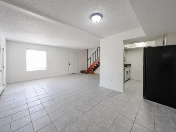 Open living area leading to the updated kitchen
