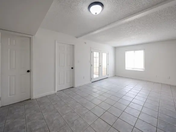 Tile-floored living area in the Phoenix townhome