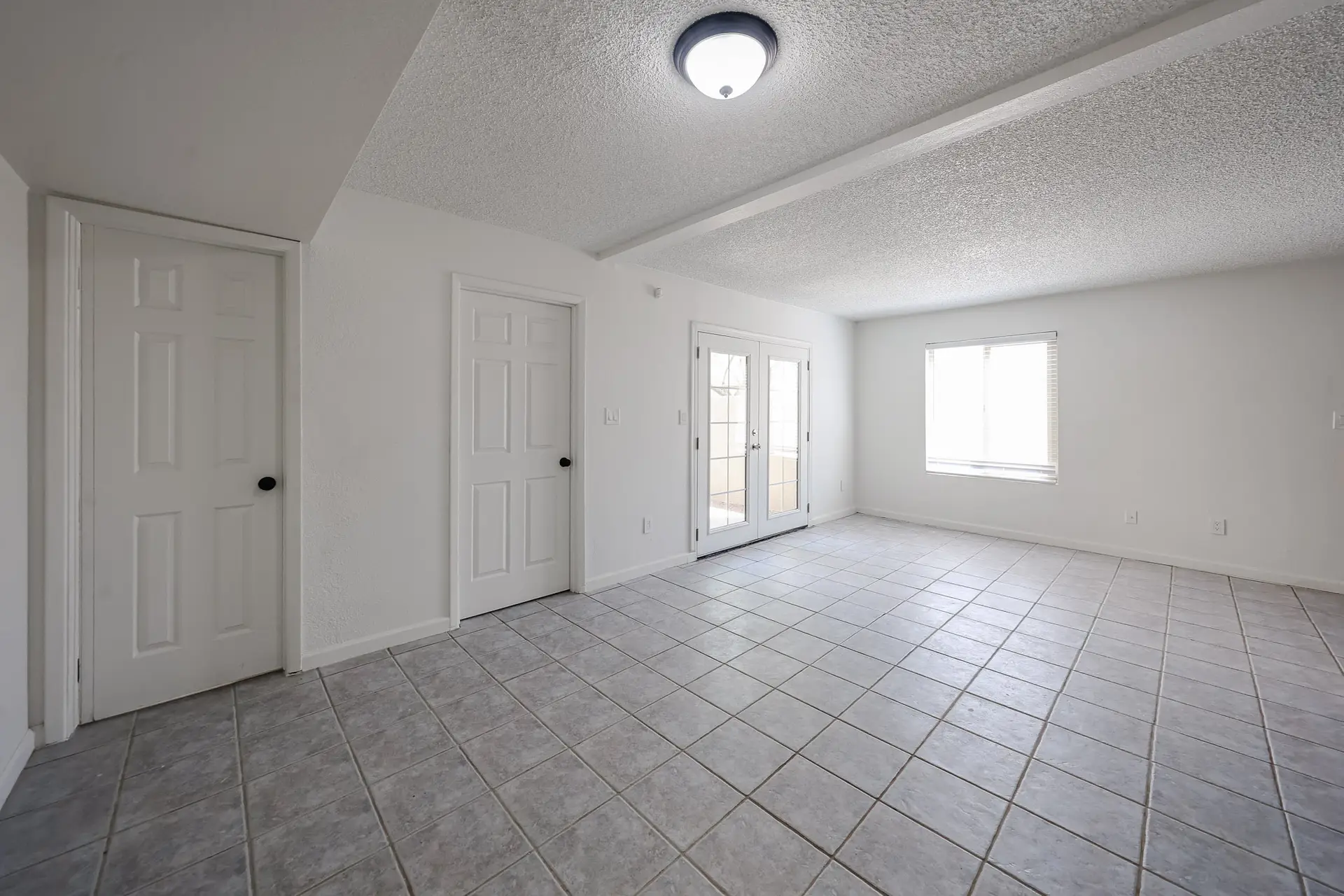 Living Area Tile-floored living area in the Phoenix townhome