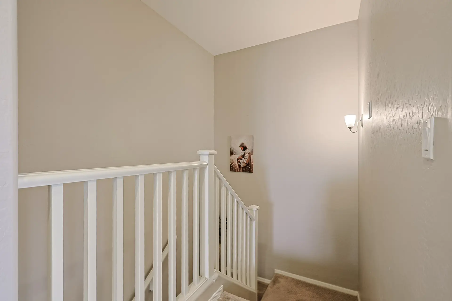 Upstairs Landing Upstairs landing and staircase at 17717 W Mandalay Ln in Surprise AZ