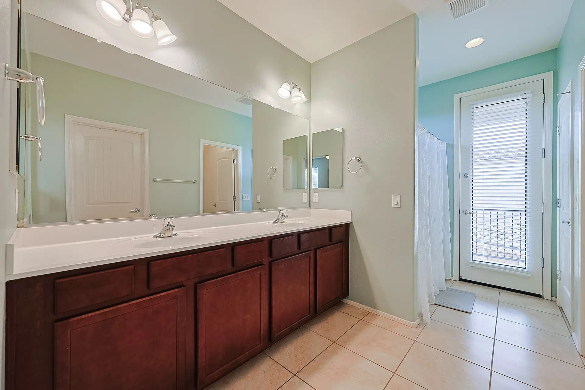 Primary Bathroom with Dual Sinks Primary bathroom with dual sinks at 17717 W Mandalay Ln