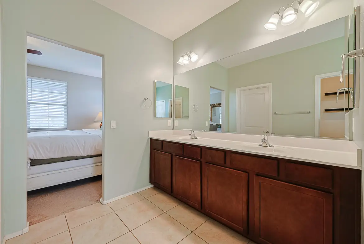 Dual-sink vanity in primary bathroom of Surprise AZ rental home
