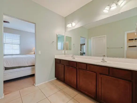 Dual-sink vanity in primary bathroom of Surprise AZ rental home