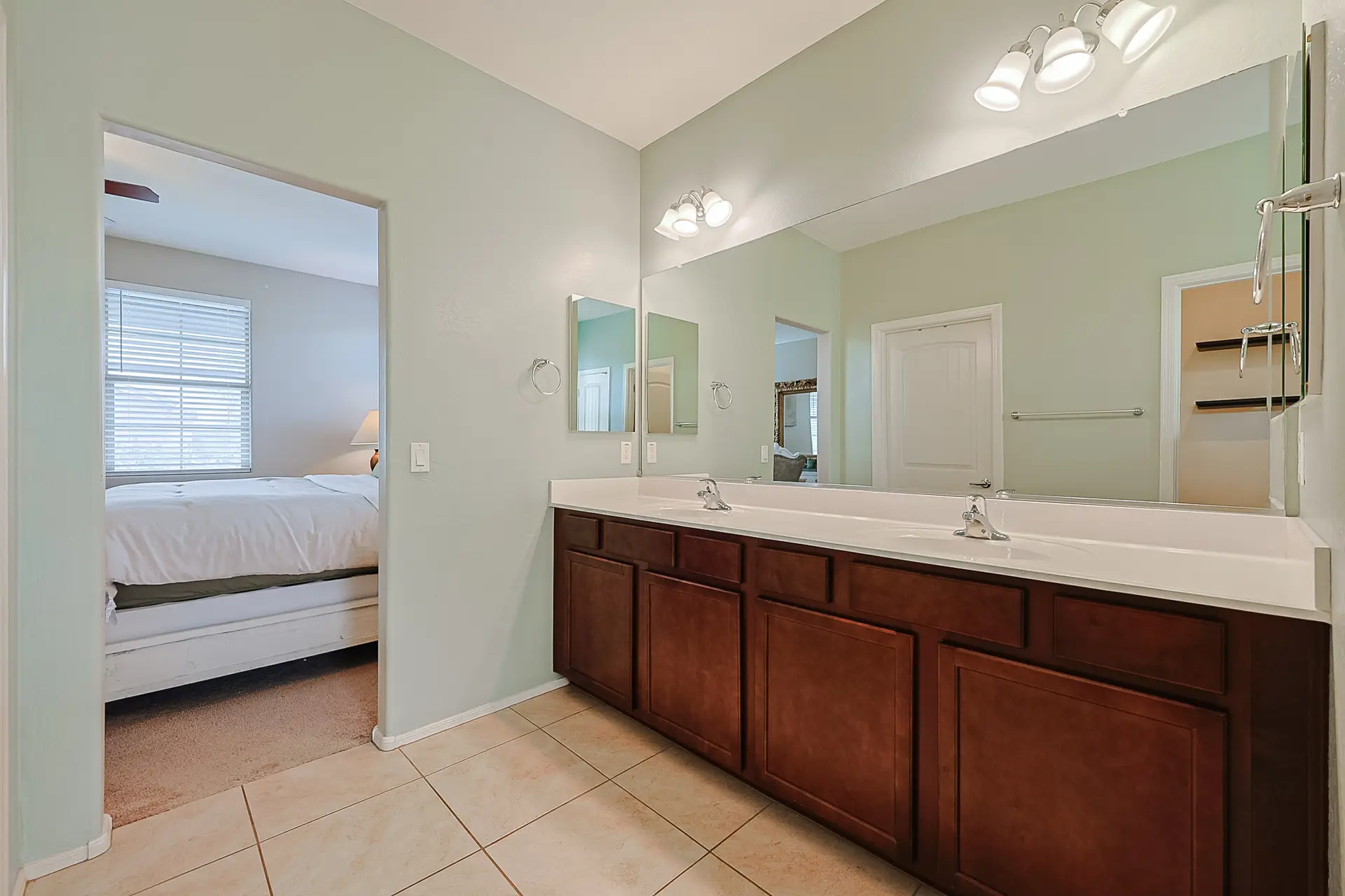 Primary Bathroom Vanity Dual-sink vanity in primary bathroom of Surprise AZ rental home