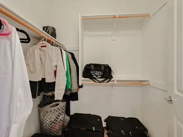 Walk-in primary closet at 17717 W Mandalay Ln in Surprise AZ