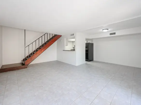 Staircase leading to the three upstairs bedrooms