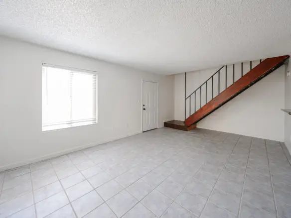 Second view of the living area and staircase