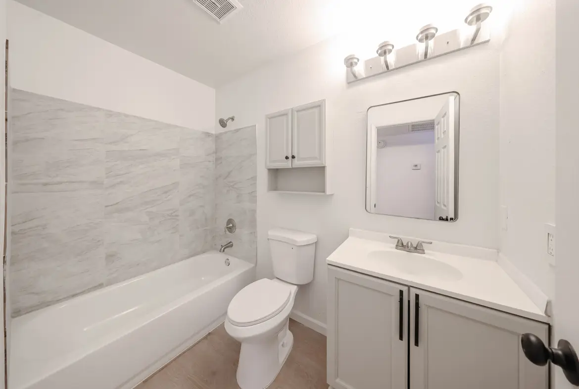Upstairs hall bathroom serving the three bedrooms