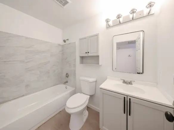 Upstairs hall bathroom serving the three bedrooms
