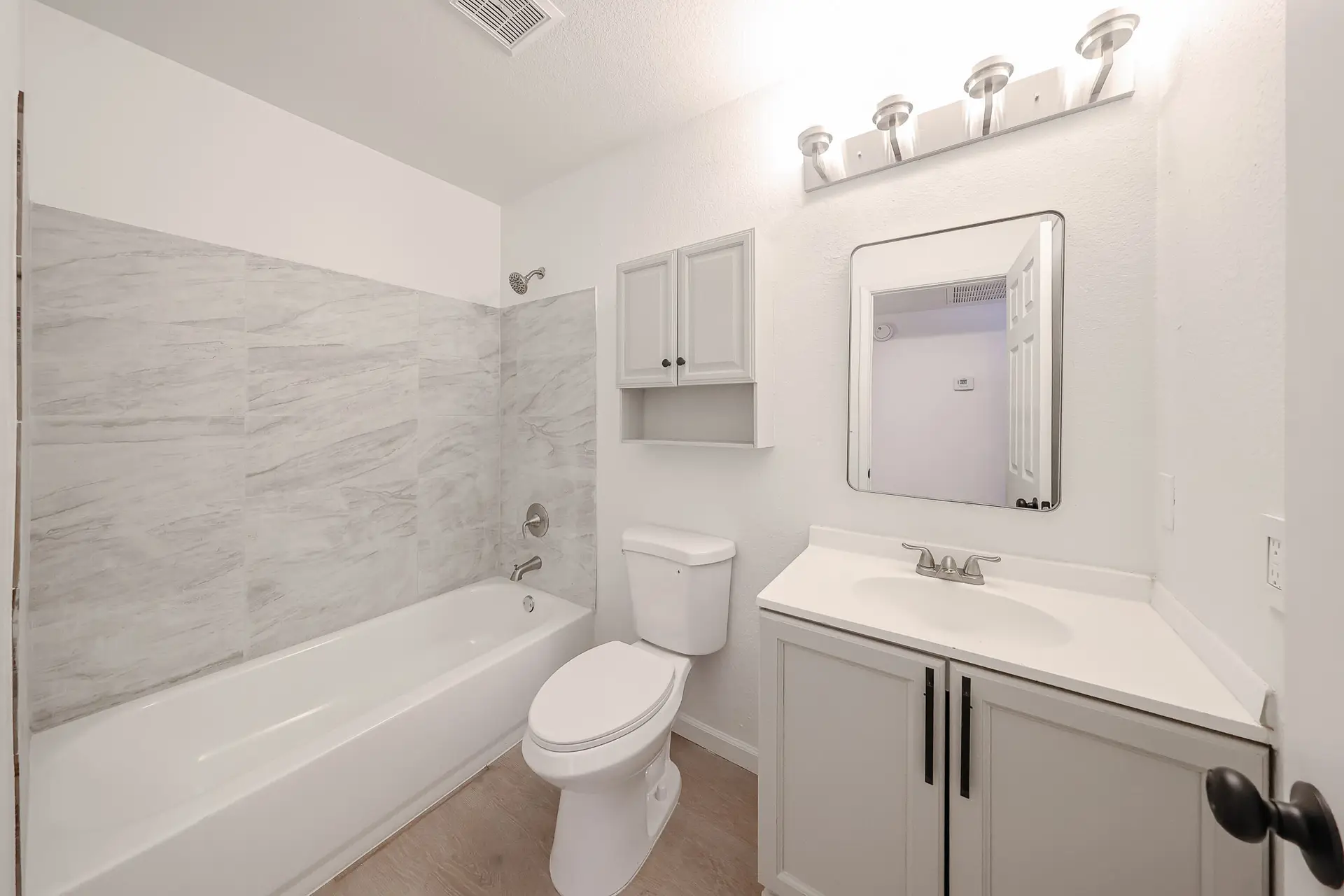 Upstairs Hall Bathroom Upstairs hall bathroom serving the three bedrooms