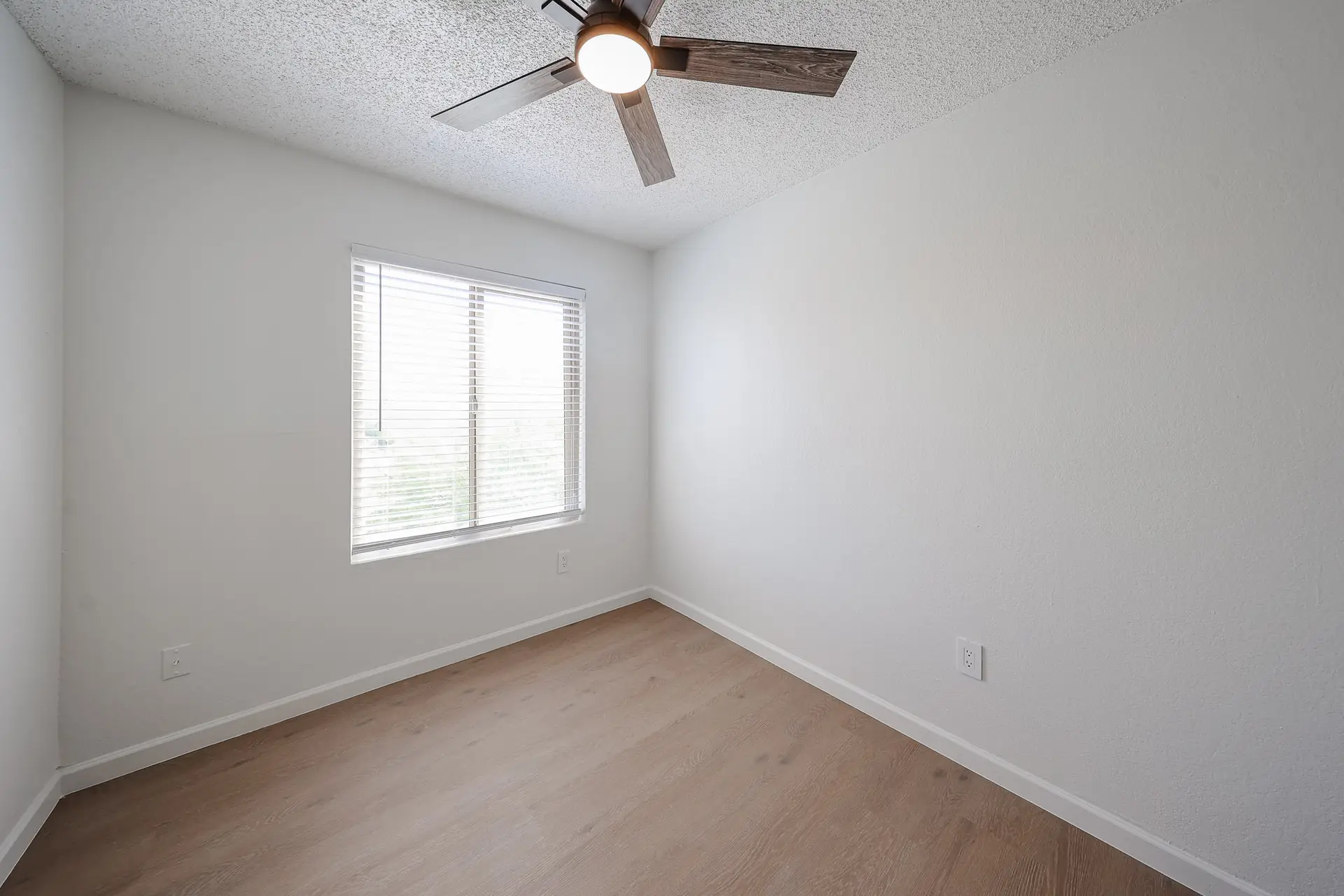 Third Bedroom Third upstairs bedroom with window and neutral finishes
