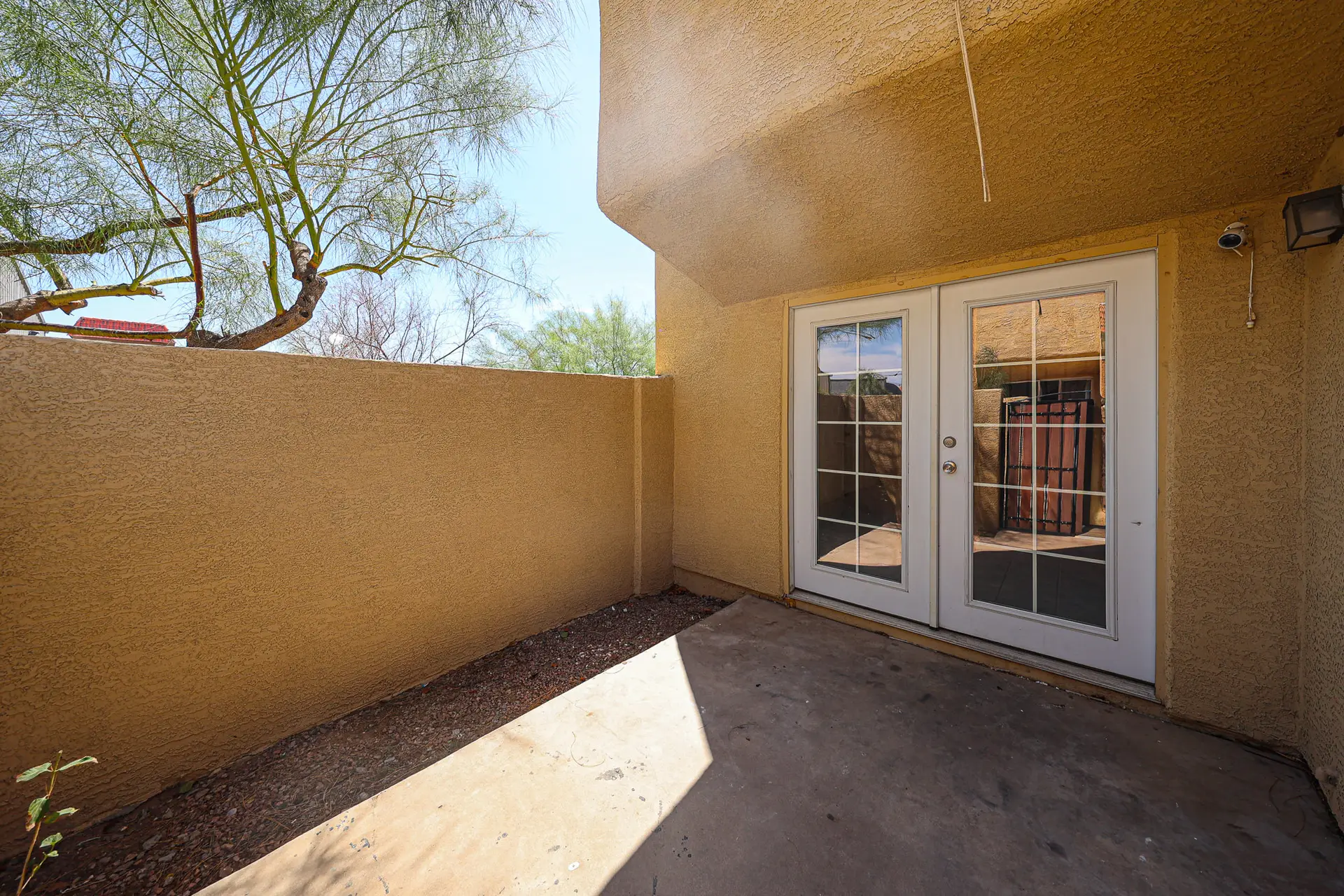 French Doors and Patio Private patio outside the living area’s French doors
