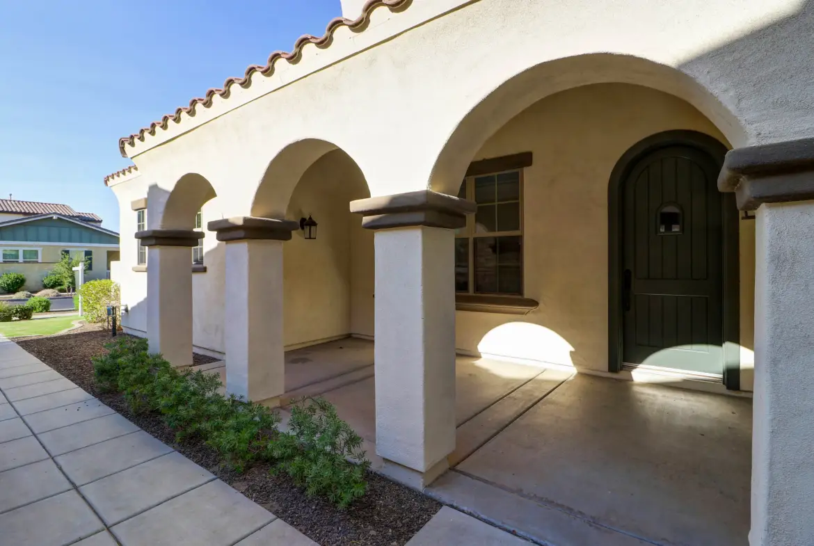 Covered front entry at 15359 W Columbine Dr in Surprise, Arizona.