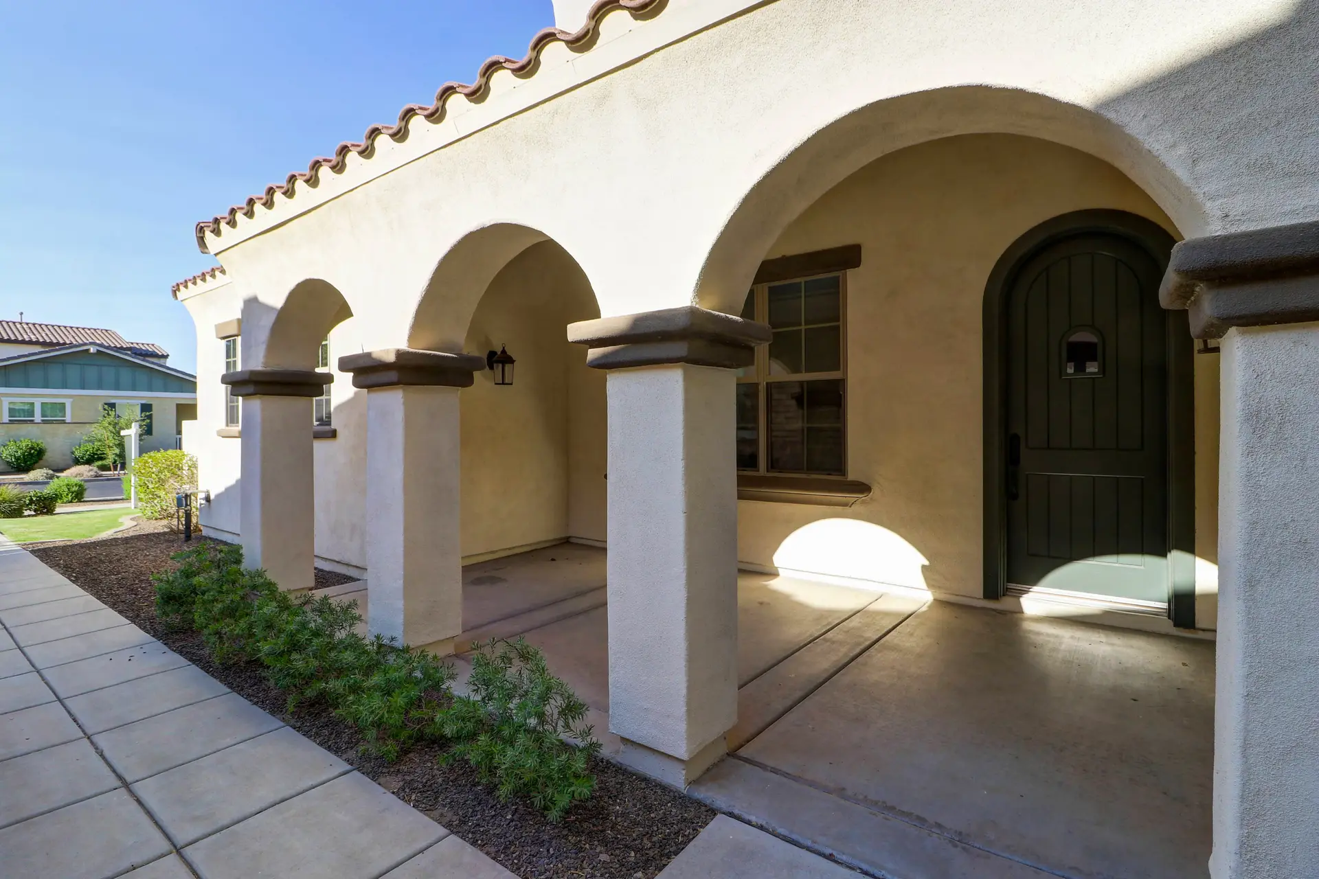 02 Covered front entry | 15359 W Columbine Dr Covered front entry at 15359 W Columbine Dr in Surprise, Arizona.