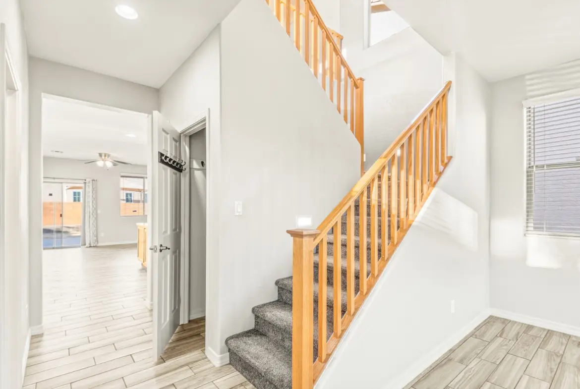 Entry and staircase at 14772 W Riviera Dr in Surprise, Arizona.