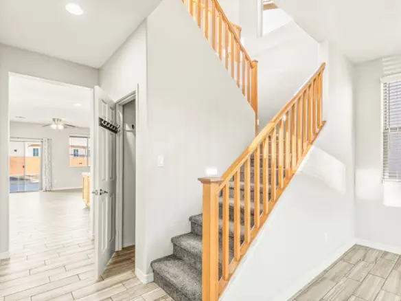 Entry and staircase at 14772 W Riviera Dr in Surprise, Arizona.
