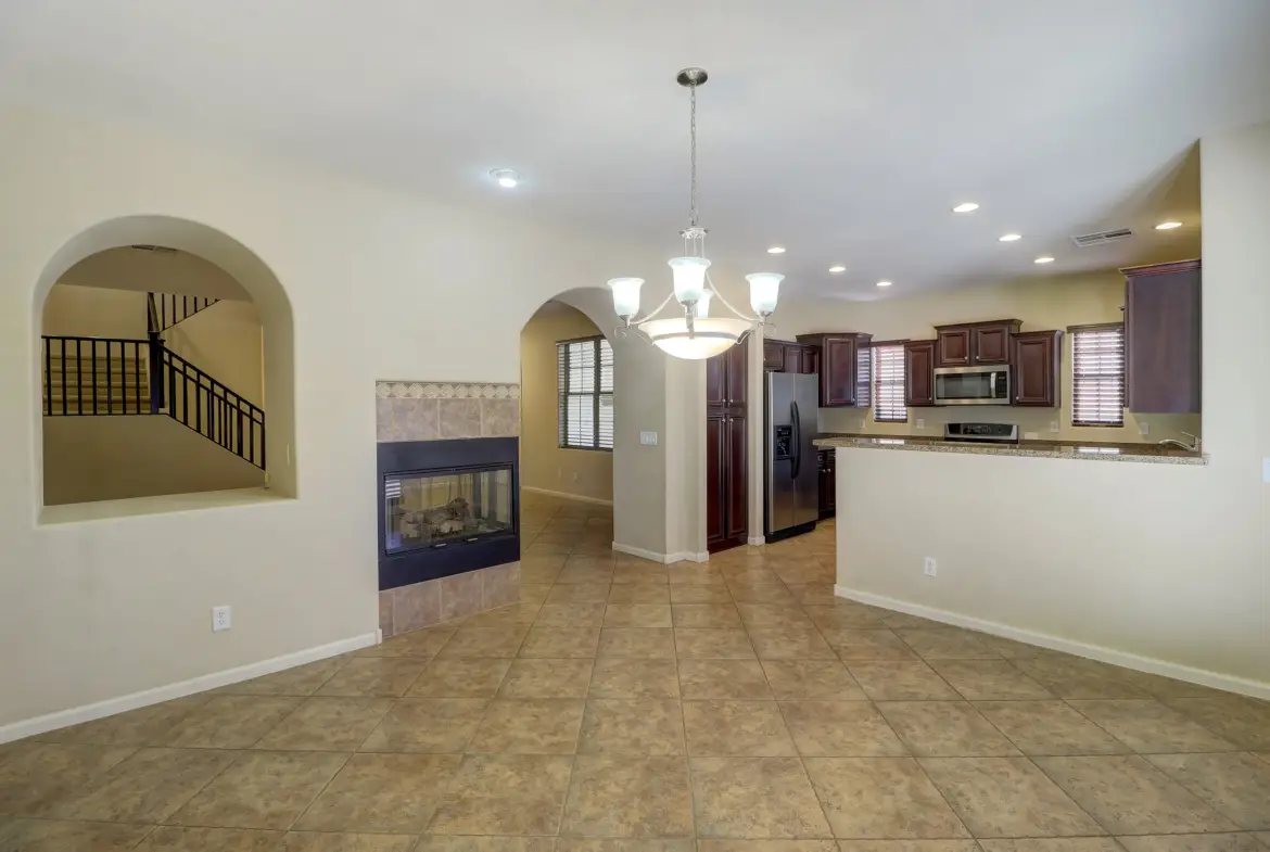 Dining room and fireplace at 15359 W Columbine Dr in Surprise, Arizona.
