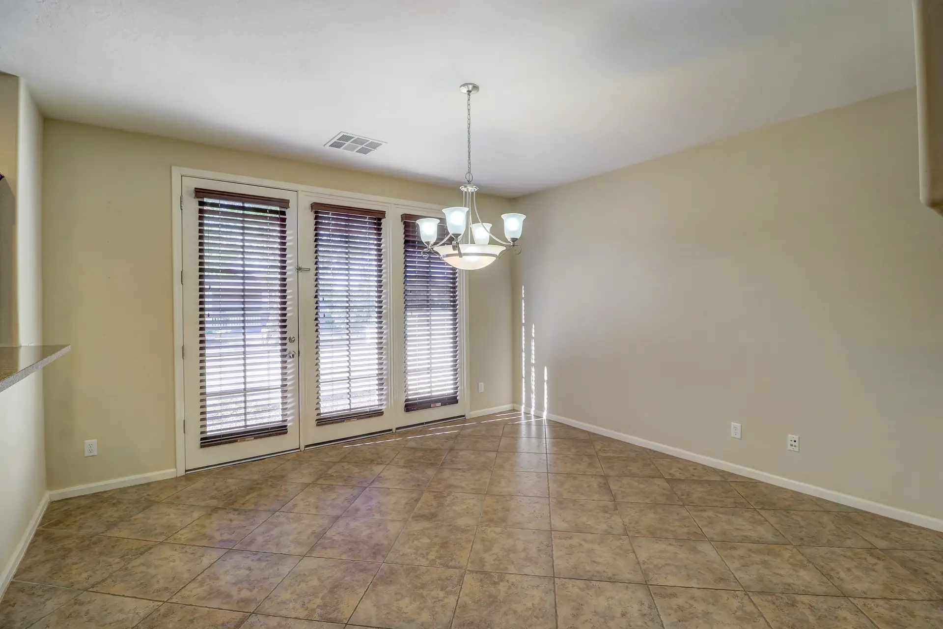 06 Dining room | 15359 W Columbine Dr Dining room at 15359 W Columbine Dr in Surprise, Arizona.