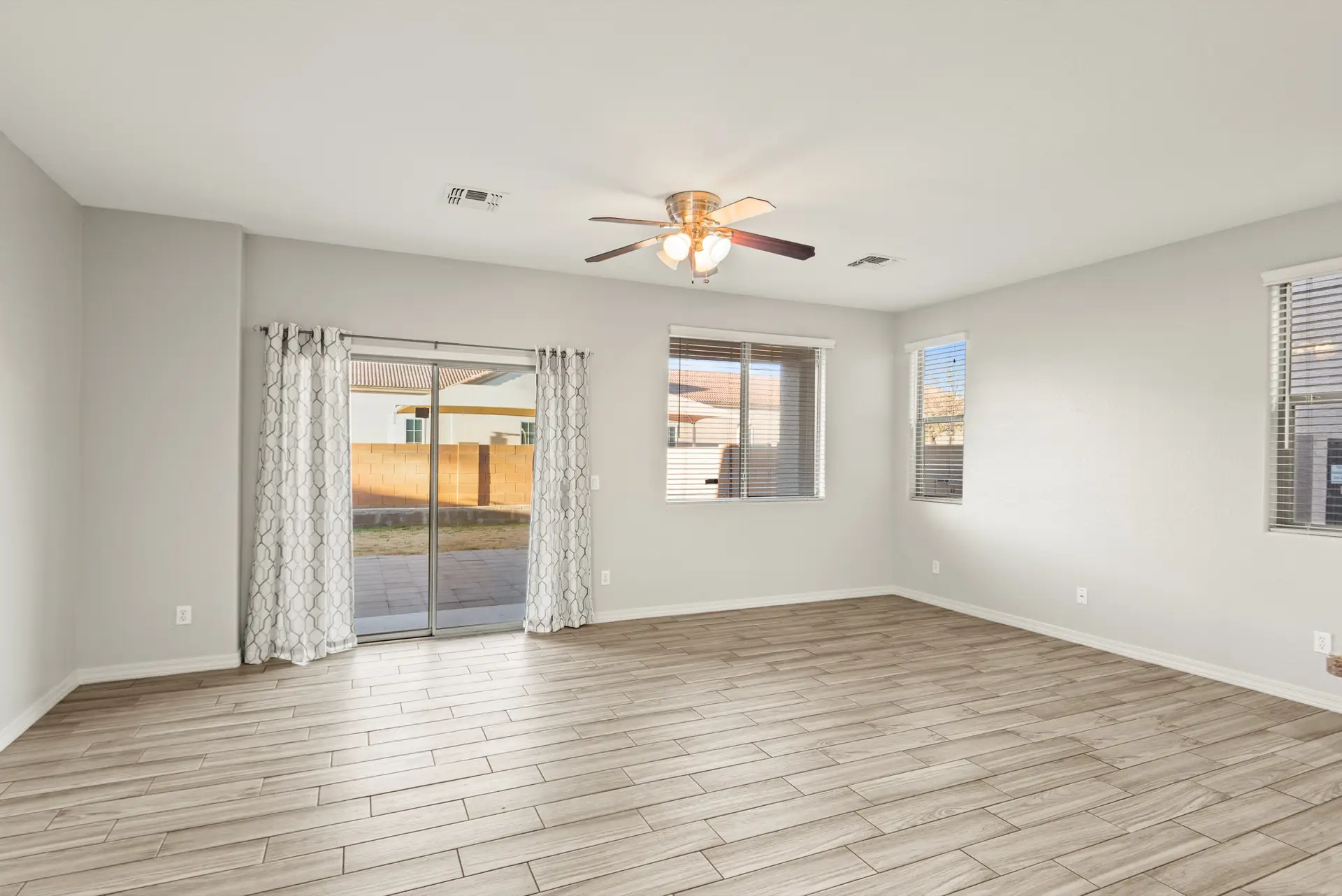08 Family room | 14772 W Riviera Dr Family room at 14772 W Riviera Dr in Surprise, Arizona.