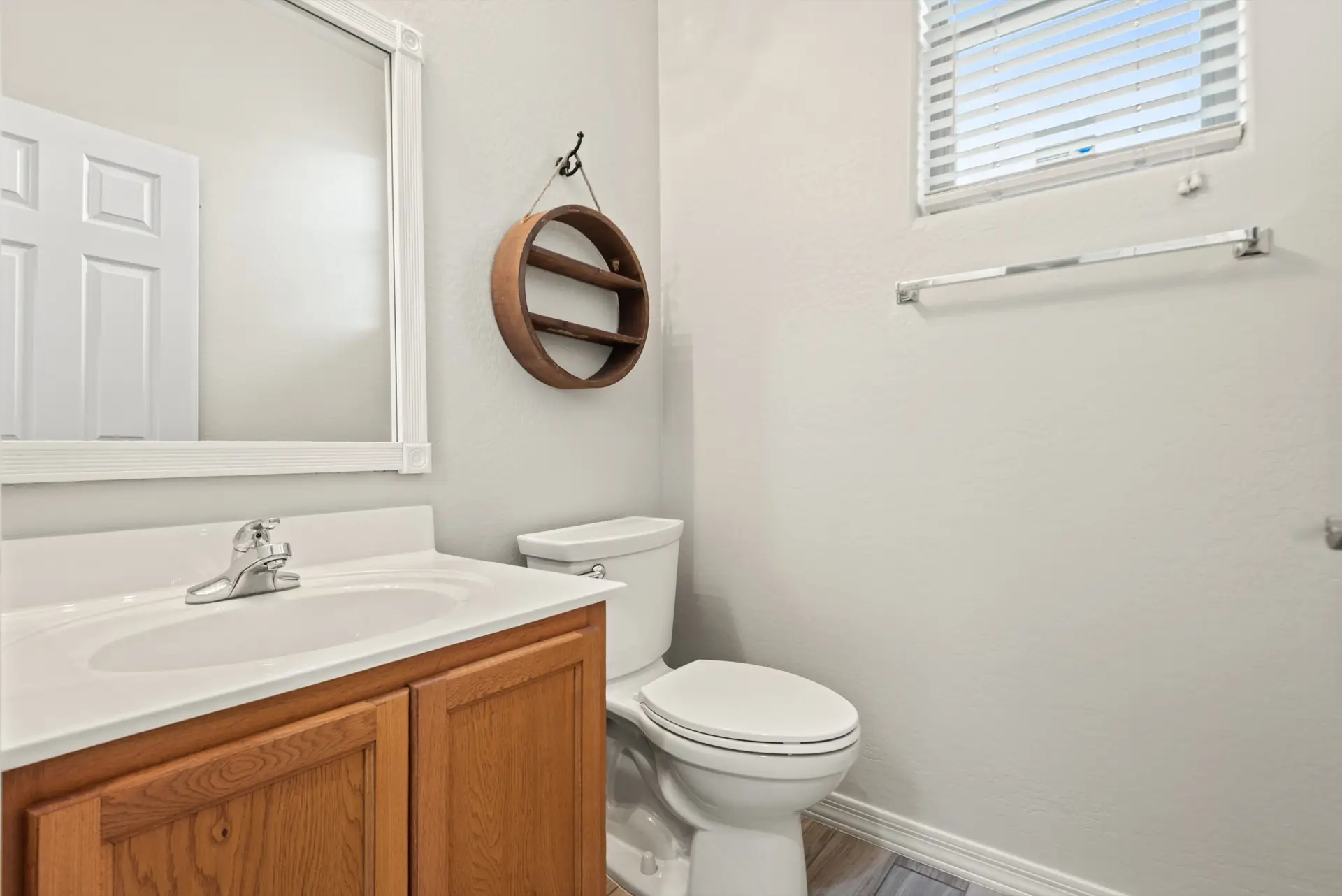 09 Downstairs half bath | 14772 W Riviera Dr Downstairs half bath at 14772 W Riviera Dr in Surprise, Arizona.