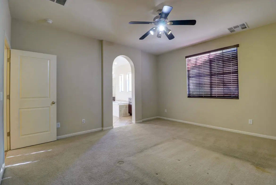 Primary bedroom at 15359 W Columbine Dr in Surprise, Arizona.