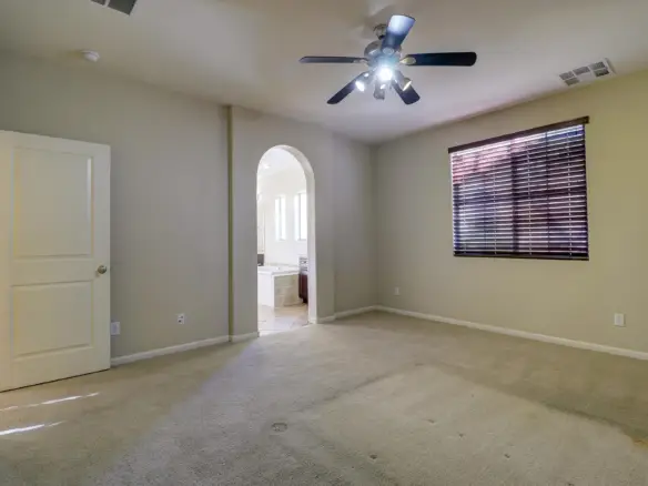 Primary bedroom at 15359 W Columbine Dr in Surprise, Arizona.