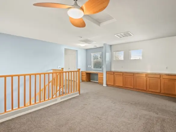 Loft built in storage at 14772 W Riviera Dr in Surprise, Arizona.