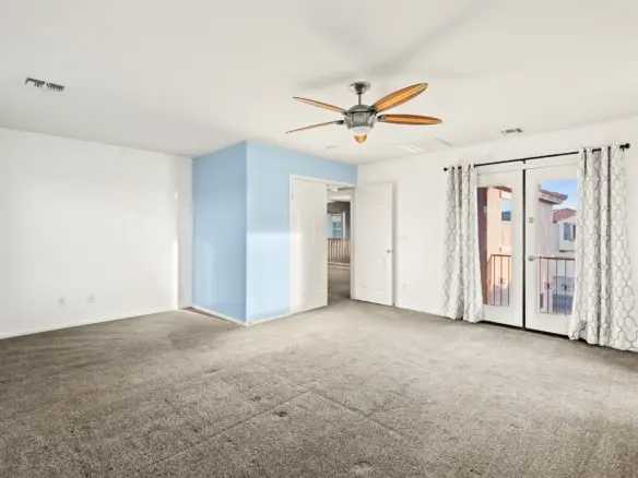 Primary bedroom at 14772 W Riviera Dr in Surprise, Arizona.