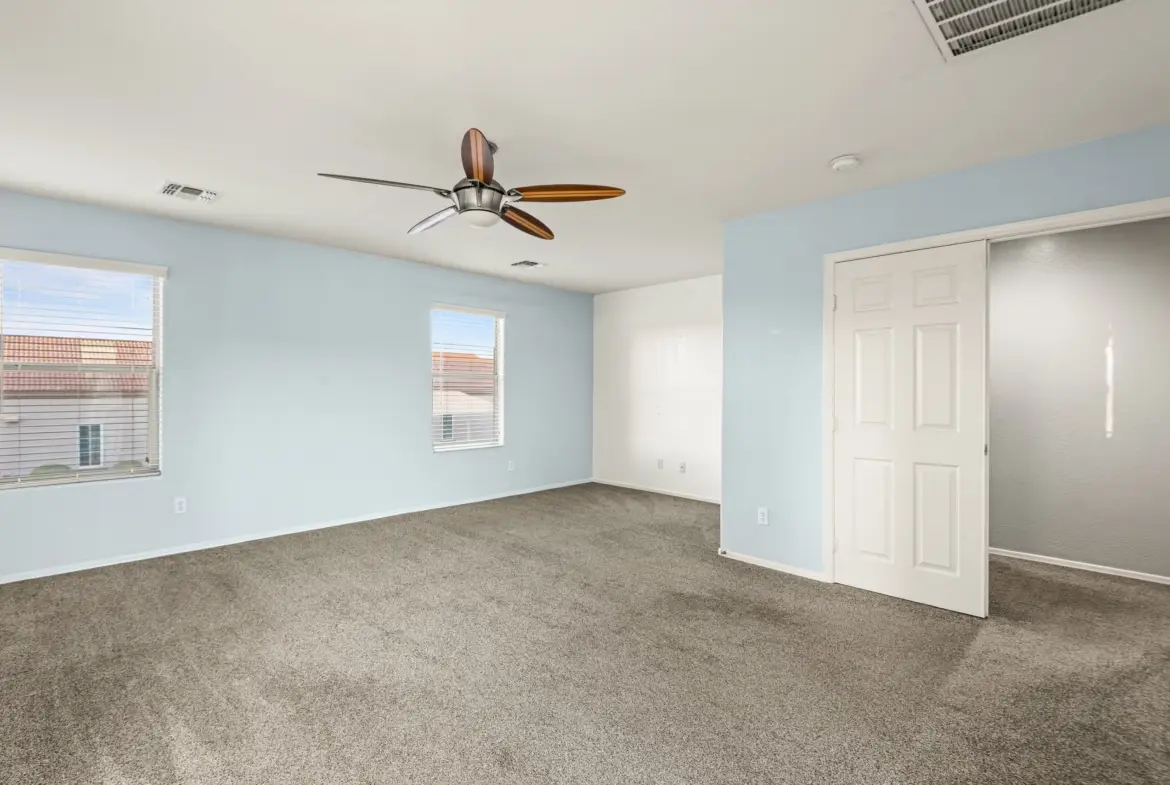 Primary bedroom second view at 14772 W Riviera Dr in Surprise, Arizona.