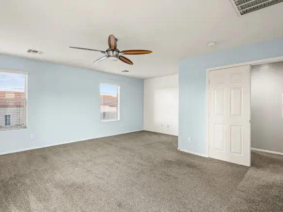 Primary bedroom second view at 14772 W Riviera Dr in Surprise, Arizona.