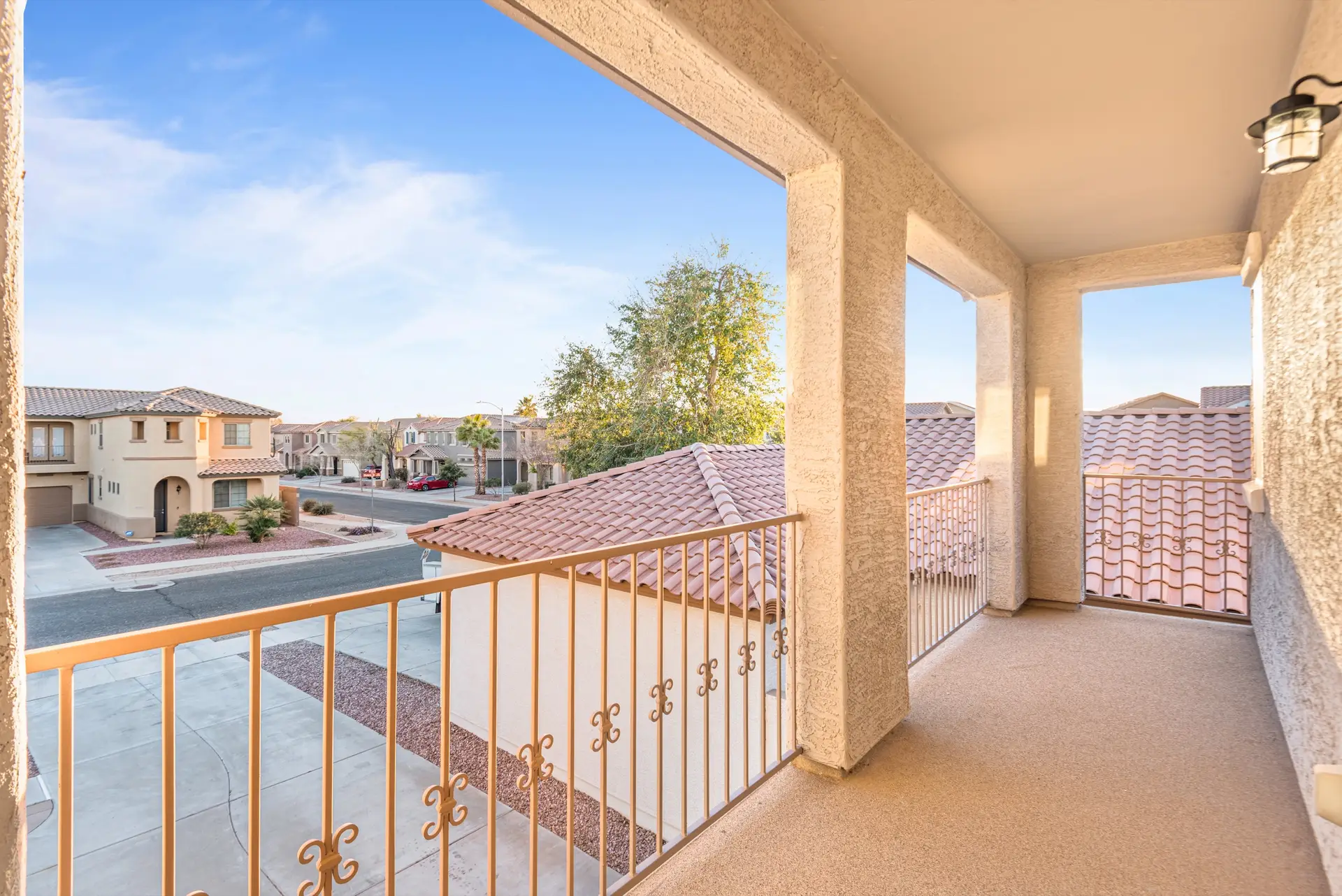 14 Primary suite balcony | 14772 W Riviera Dr Primary suite balcony at 14772 W Riviera Dr in Surprise, Arizona.