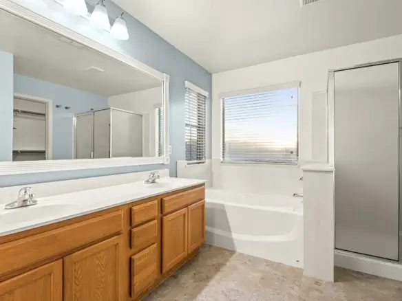 Primary bathroom at 14772 W Riviera Dr in Surprise, Arizona.