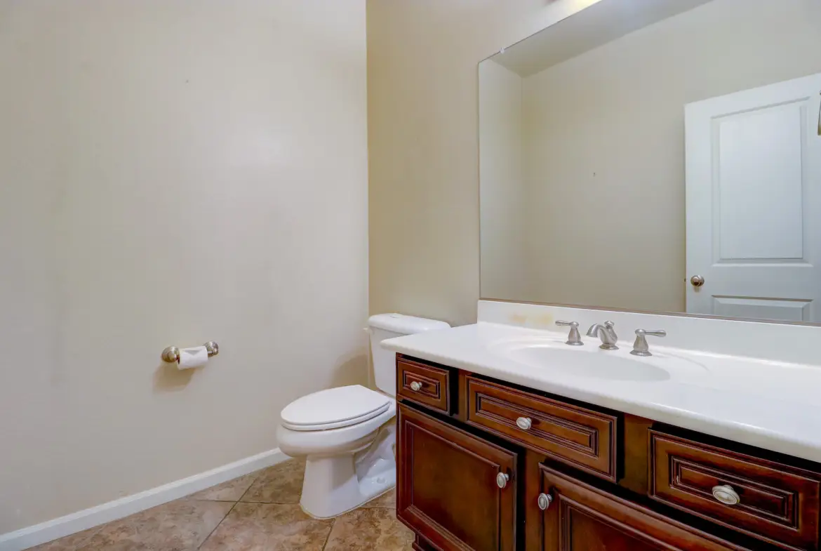 Half bathroom at 15359 W Columbine Dr in Surprise, Arizona.
