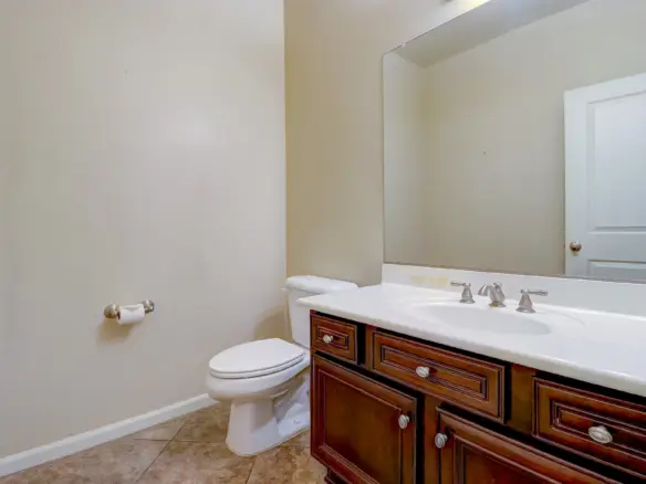 Half bathroom at 15359 W Columbine Dr in Surprise, Arizona.