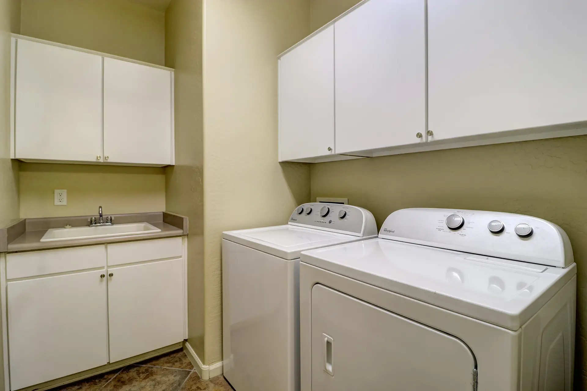 16 Laundry room | 15359 W Columbine Dr Laundry room at 15359 W Columbine Dr in Surprise, Arizona.