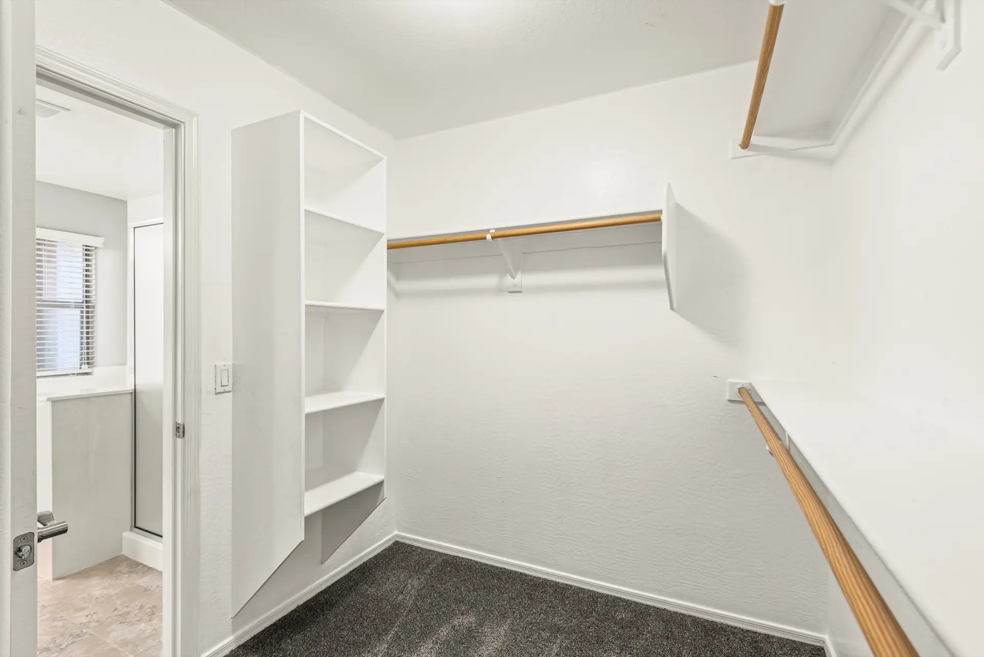 17 Walk in closet | 14772 W Riviera Dr Walk in closet at 14772 W Riviera Dr in Surprise, Arizona.