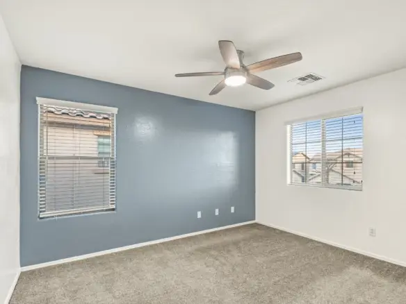 Bedroom two at 14772 W Riviera Dr in Surprise, Arizona.