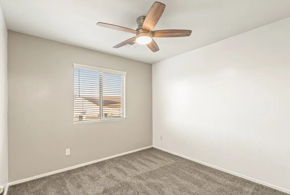 Bedroom three at 14772 W Riviera Dr in Surprise, Arizona.