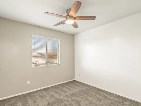 Bedroom three at 14772 W Riviera Dr in Surprise, Arizona.