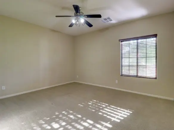 Bedroom two at 15359 W Columbine Dr in Surprise, Arizona.