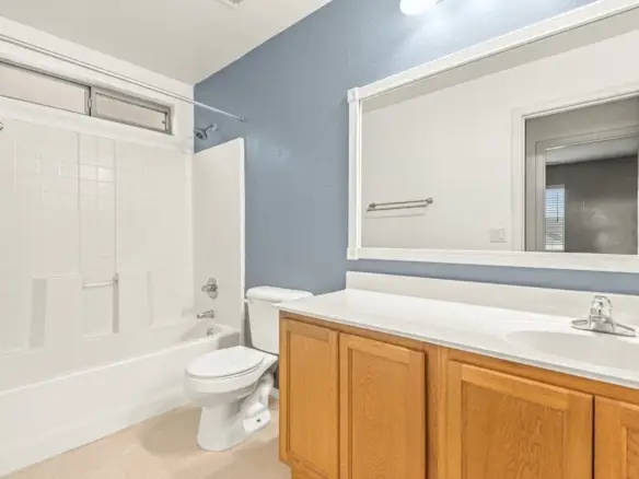 Upstairs hall bathroom at 14772 W Riviera Dr in Surprise, Arizona.
