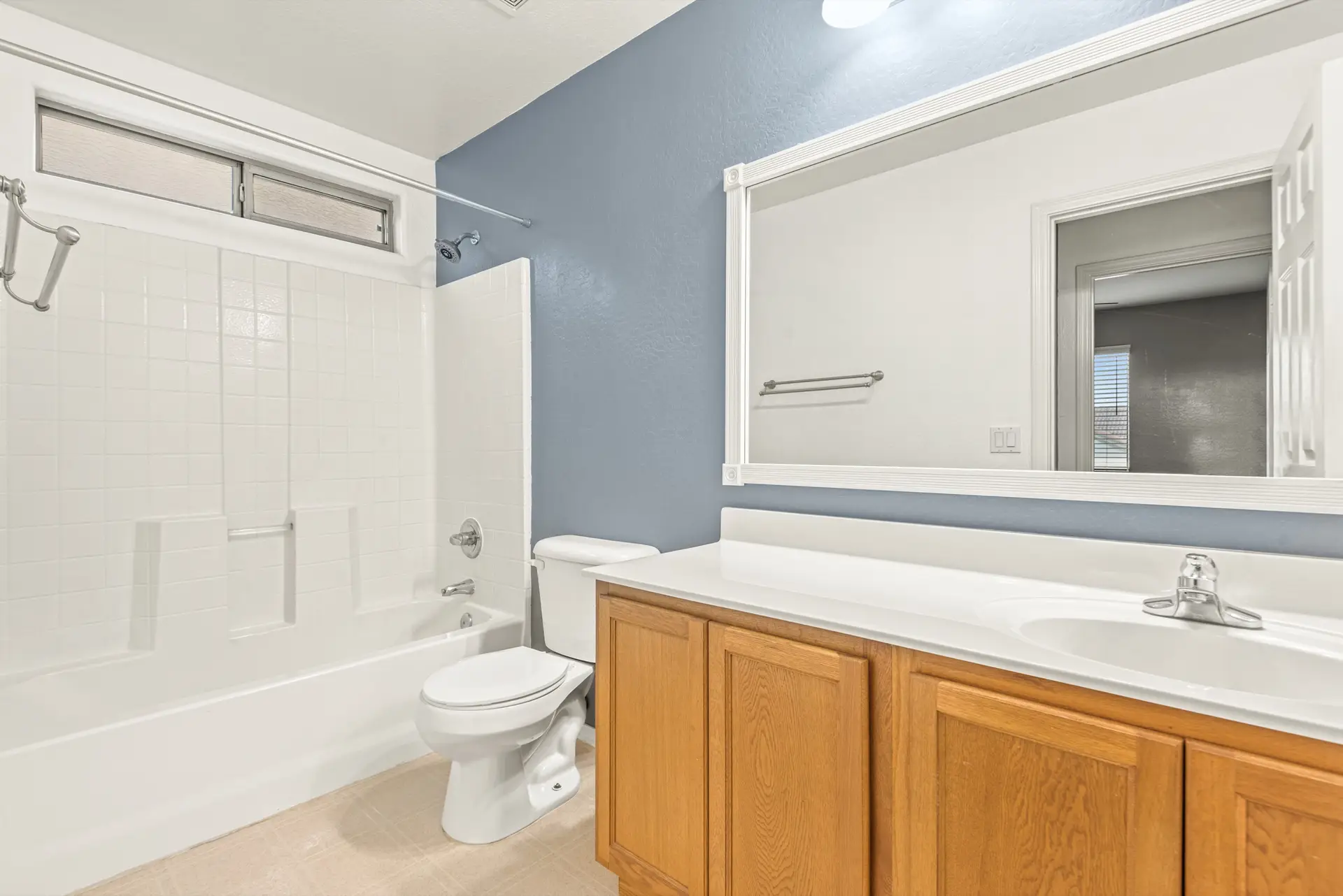 22 Upstairs hall bathroom | 14772 W Riviera Dr Upstairs hall bathroom at 14772 W Riviera Dr in Surprise, Arizona.