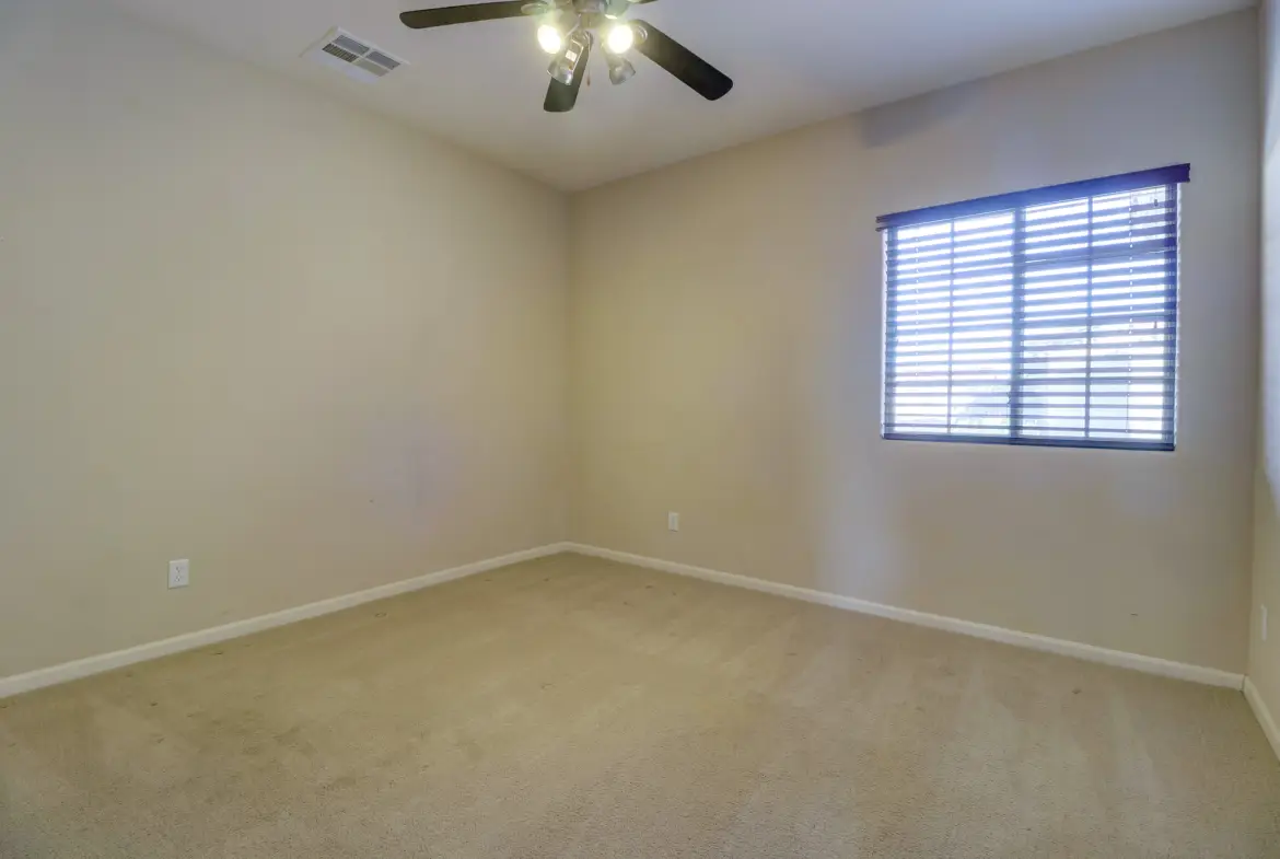 Bedroom three at 15359 W Columbine Dr in Surprise, Arizona.