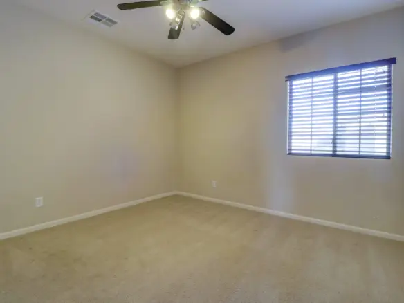 Bedroom three at 15359 W Columbine Dr in Surprise, Arizona.