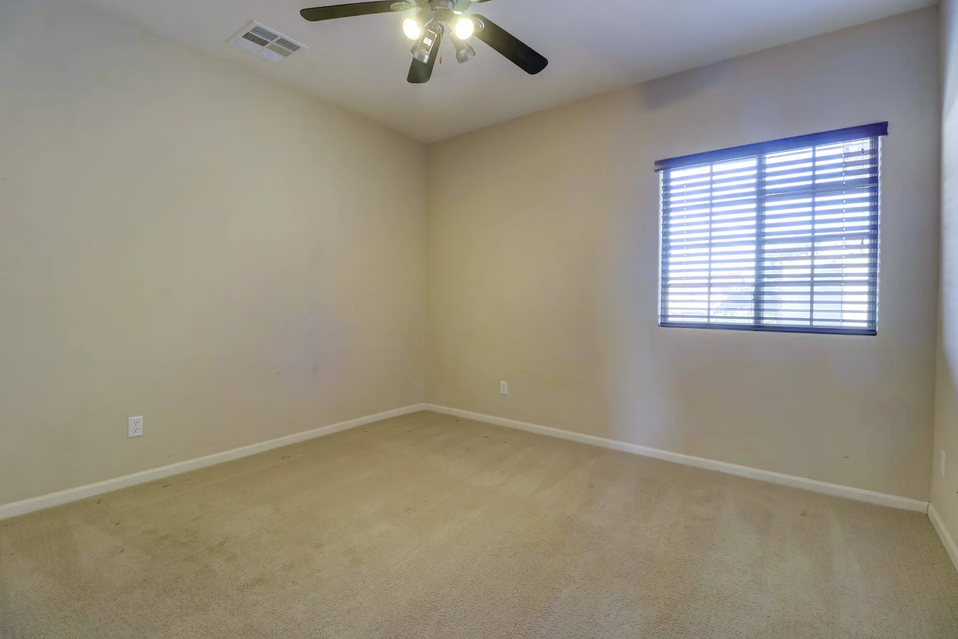 22 Bedroom three | 15359 W Columbine Dr Bedroom three at 15359 W Columbine Dr in Surprise, Arizona.