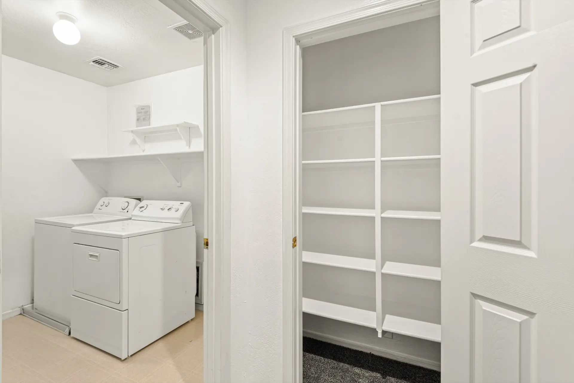 23 Laundry and storage | 14772 W Riviera Dr Laundry and storage at 14772 W Riviera Dr in Surprise, Arizona.