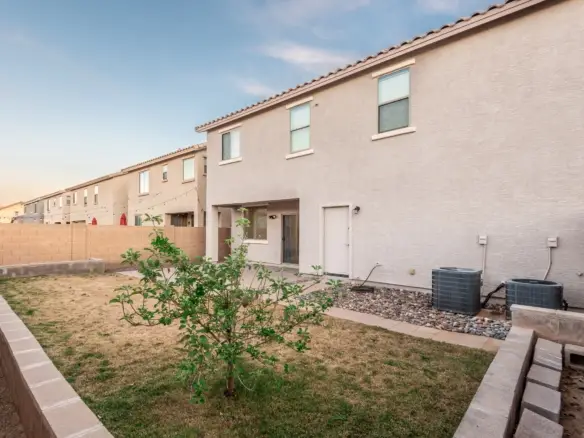 Fenced backyard at 14772 W Riviera Dr in Surprise, Arizona.